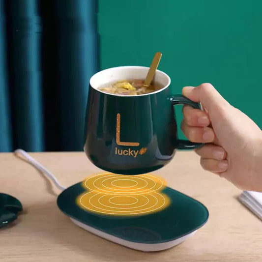 TAZA DE CAFE  CON CALENTADOR